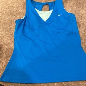 Ladies blue active wear top with built-in bra for working out, or playing tennis